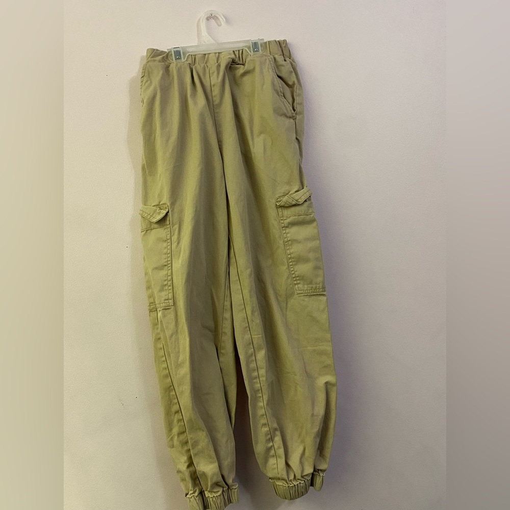 tan cargos, elastic waistband + ankles, pockets on side and front